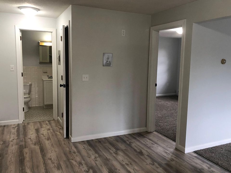 New Flooring in Kitchen, walkway to coat closet and bathroom