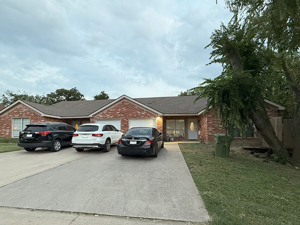 Outside view of home. This Duplex is completely split in the middle and you have your own private garage.