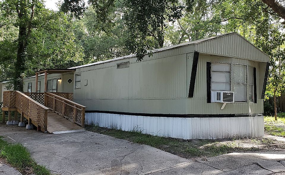Front showing ramp and porch