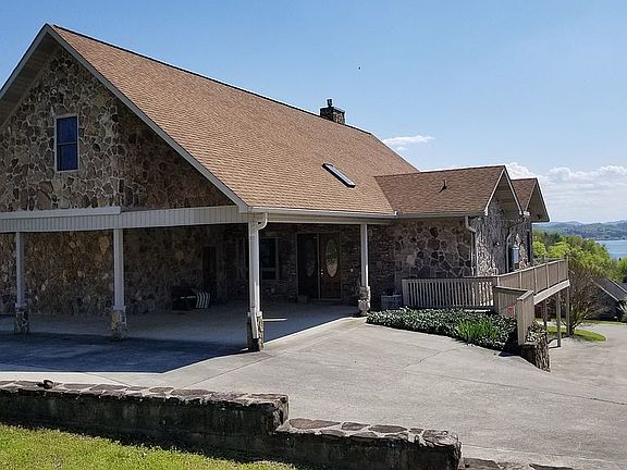 Carport and circle drive