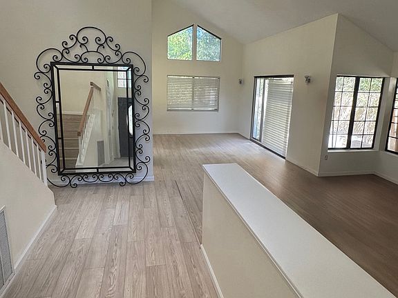 More photos coming soon!! Entry way Dining room, Living room (partial view). Windows galore! Property renovation near completion.