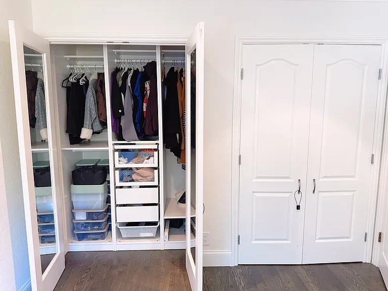 2 custom built-in closets in third bedroom