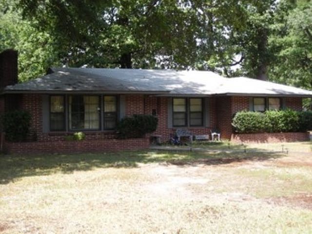 1st image of 1501 W 32nd Ave