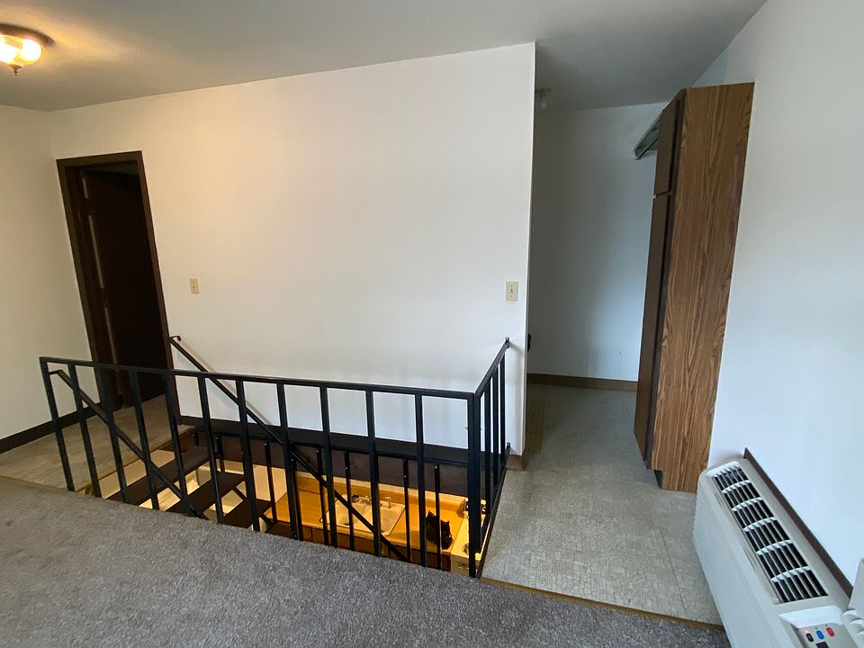 upstairs (bathroom on left, walk-in closet on right, a/c unit)