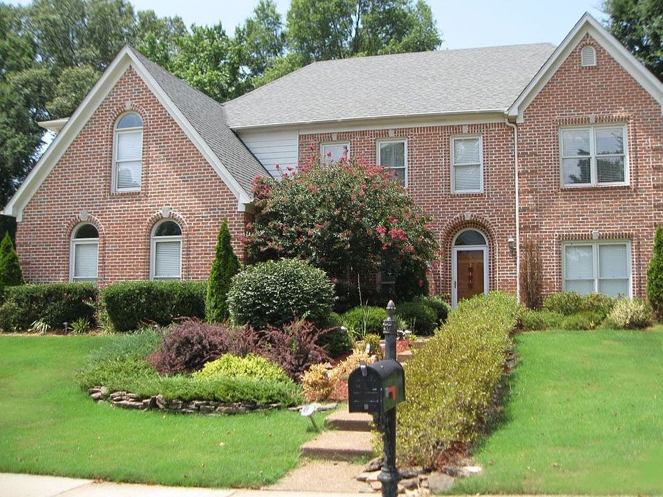 Beautiful elevation on corner lot with much privacy.