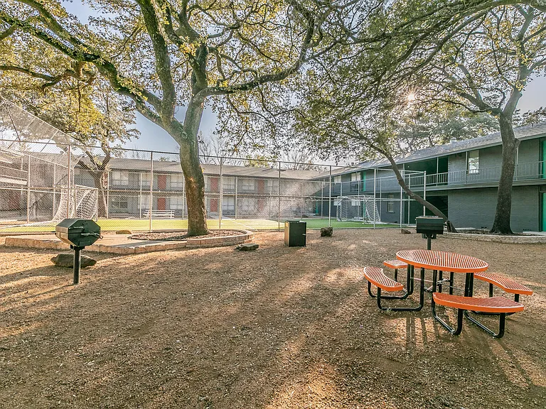 Connect with neighbors at the pavilion and outdoor lounge at Chapel Creek Apartments in Dallas.