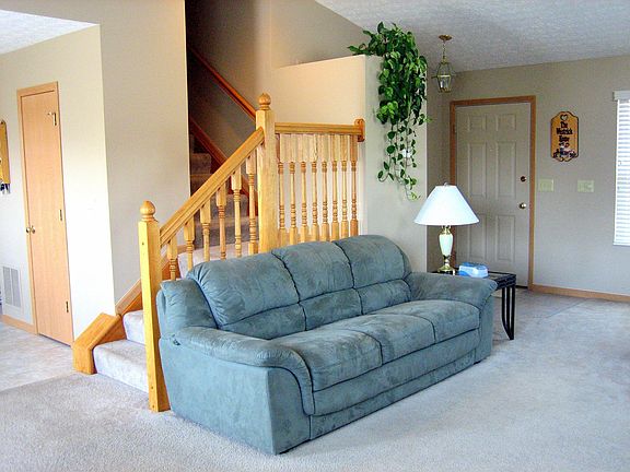 Open-landing stairs add character to large great room