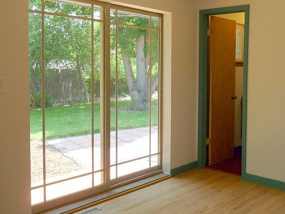 Master bedroom with two closets opens to its own backyard deck.