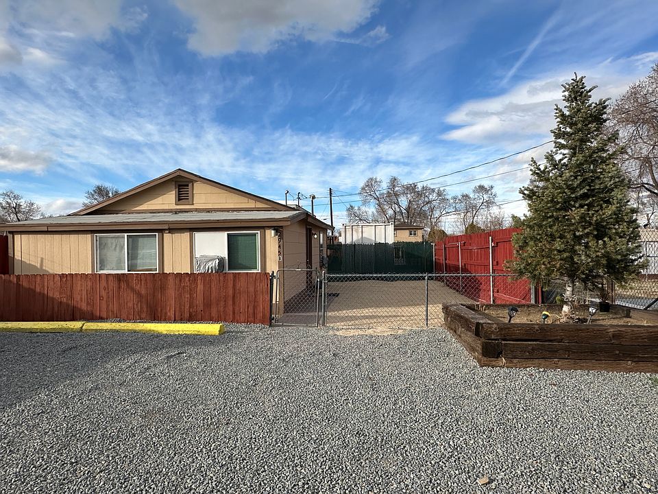 Front of house, parking spaces in front