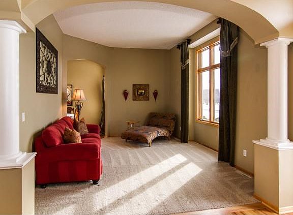 Just to the right as you enter is this flex room perfect for reading, a music room, or install French doors for a home office.