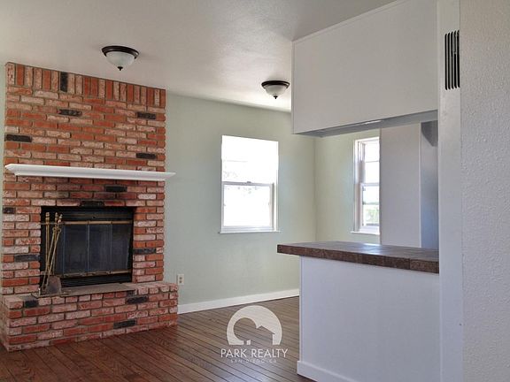 Fireplace and vacant dining area
