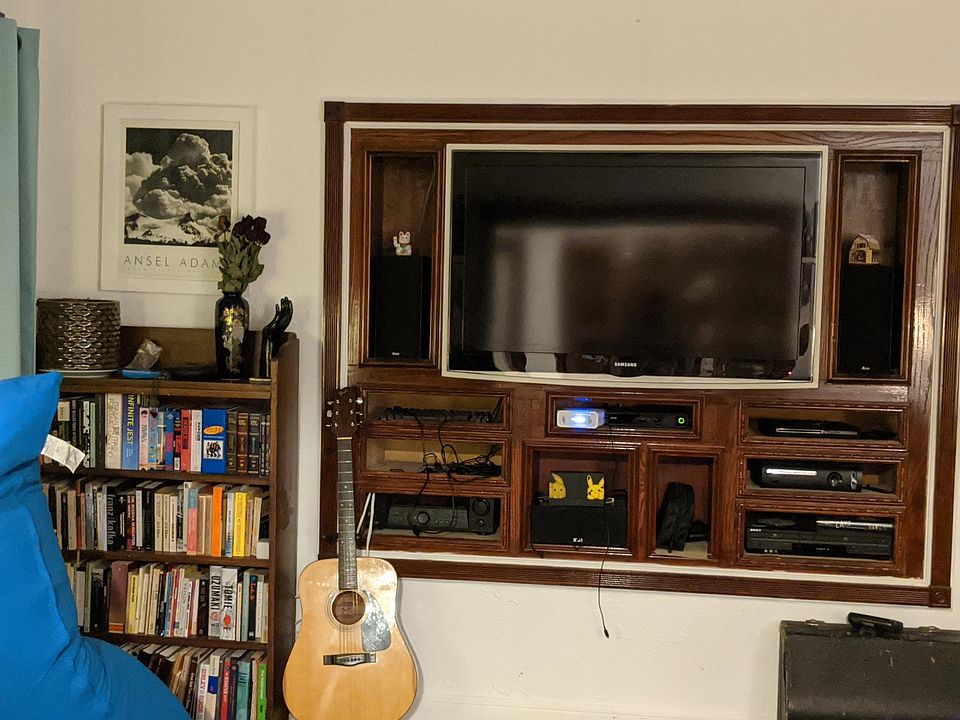 The inset TV is included with the apartment!