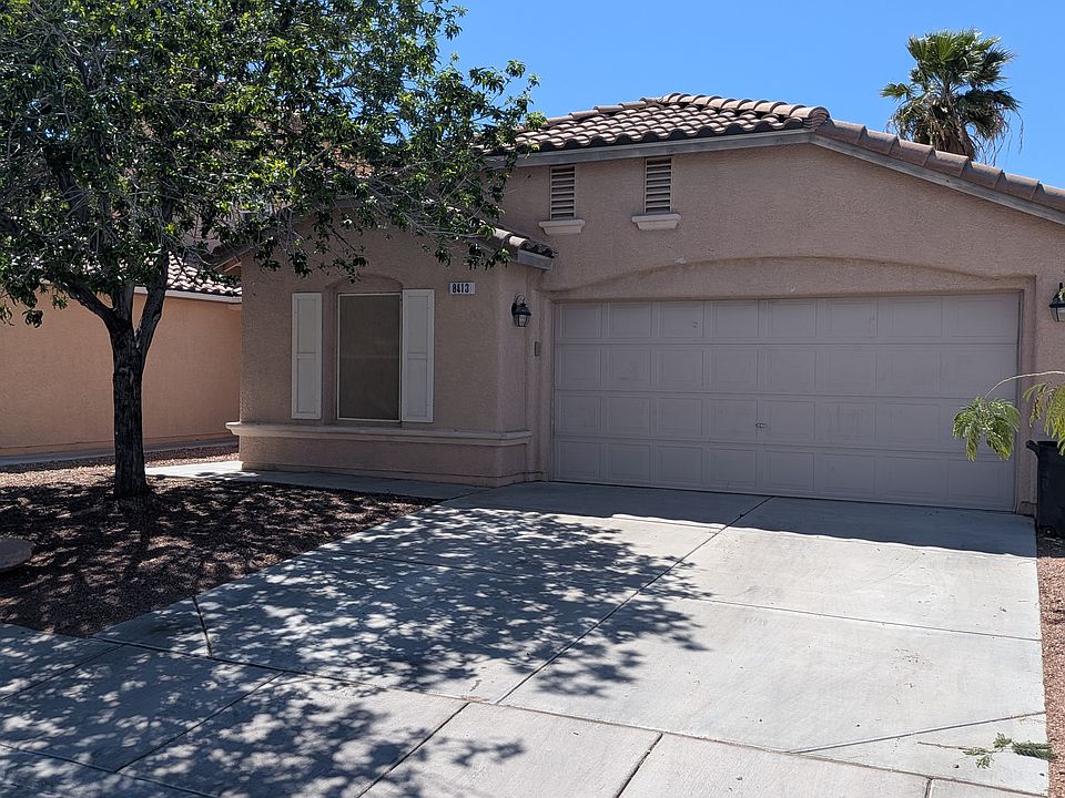 Front of home with 2 car garage and on-street parking - Iron Mountain Home For Rent