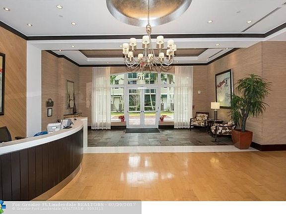 Concierge desk and front entry to condo building