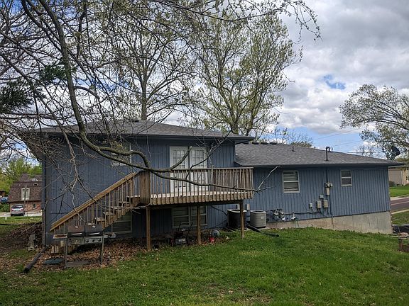 Back of House. The yard is shared with the tenant in Unit B. The deck is for your private use.