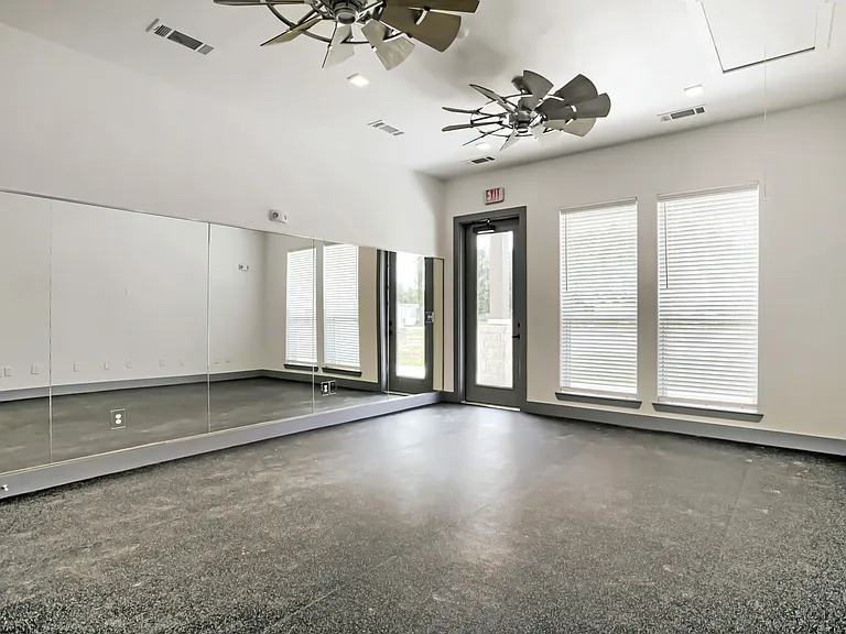 fitness center with mirror