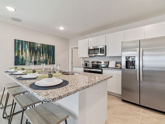 Kitchen island with breakfast bar