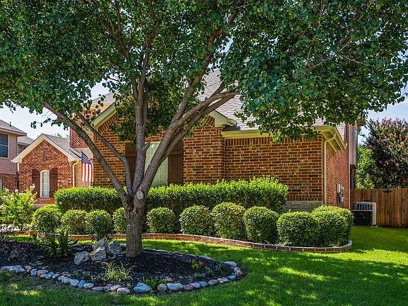 Beautiful Landscaping across the front of the home
