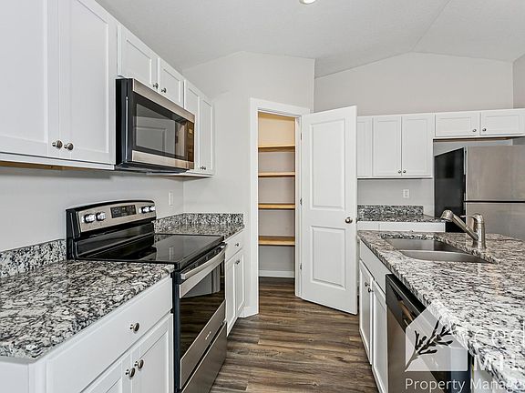 3rd image of 1907 E 69th Ct N
