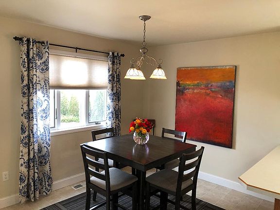 Dining Area with french door (not shown) out to back redwood deck.
