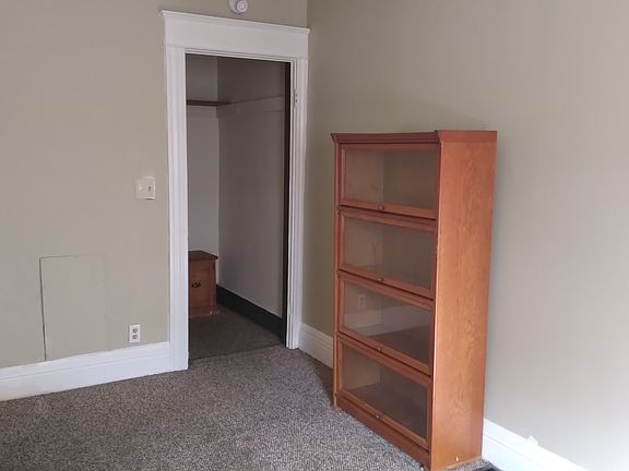 Use as bedroom or living room. rug and cabinet will be removed before occupancy