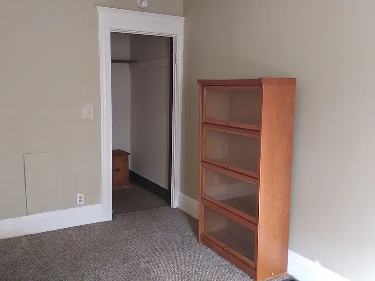 Use as bedroom or living room. rug and cabinet will be removed before occupancy