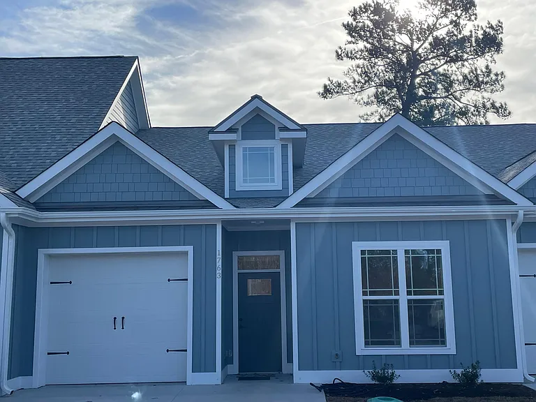Front of Townhome with One car Finished Garage