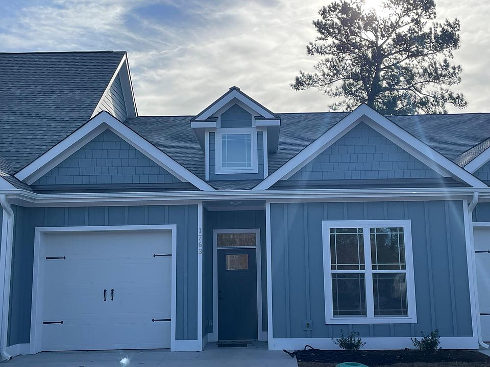 Front of Townhome with One car Finished Garage