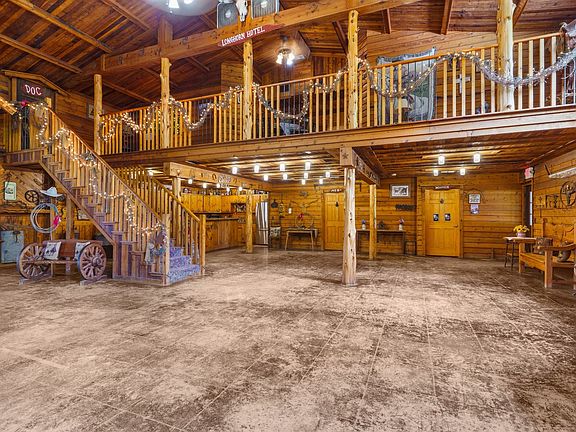 Kitchen and upstairs loft with 2 bedrooms.