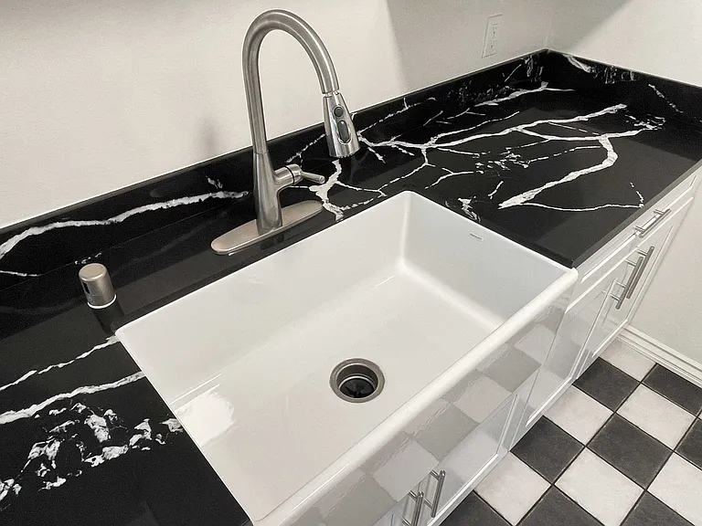 Deep, chef's grade sinks with ugraded faucets