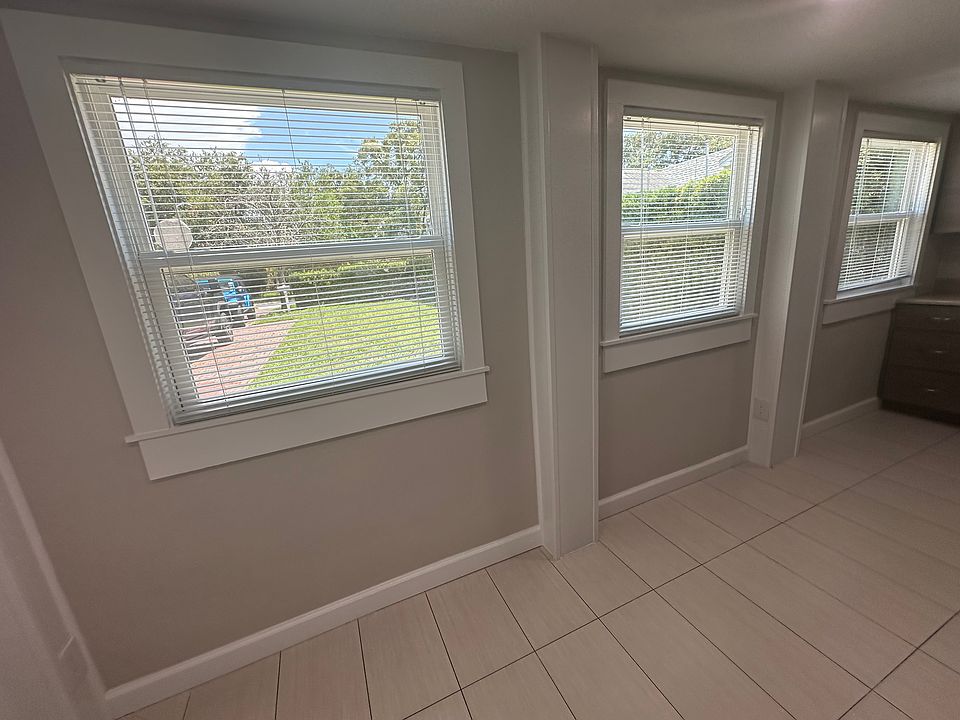 Kitchen windows overlooking patio.