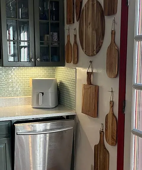cutting boards on kitchen wall