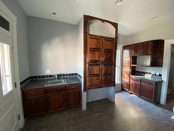 Kitchen has its own wet bar and pantry (this is not the main sink!)