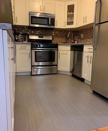 4th image of 9017 Holland Ave #1