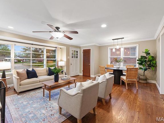 Large front windows draw natural light in.