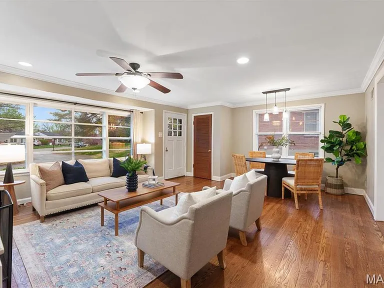 Large front windows draw natural light in.