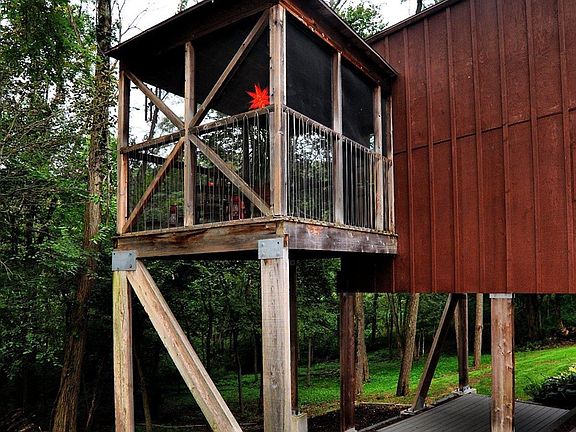 Tree-house, cedar screened-in porch.