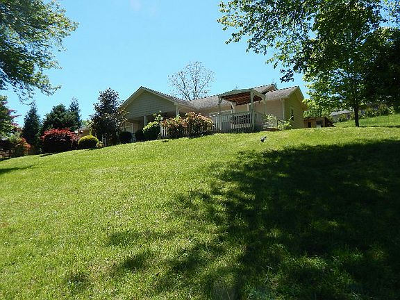 Image 4: House from bottom of property line to neighbors