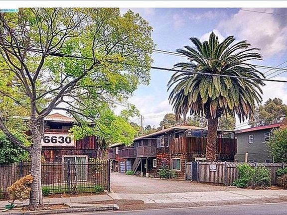 Red marks - your front door! Enter this private lane to your 2/2 condo w/ garage parking!