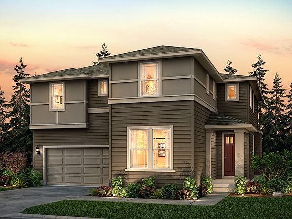 The Lynwood, a single family, two-story home with a two-car garage shown in Exterior Home Design C.