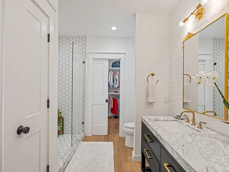 primary bath and walk-in closet