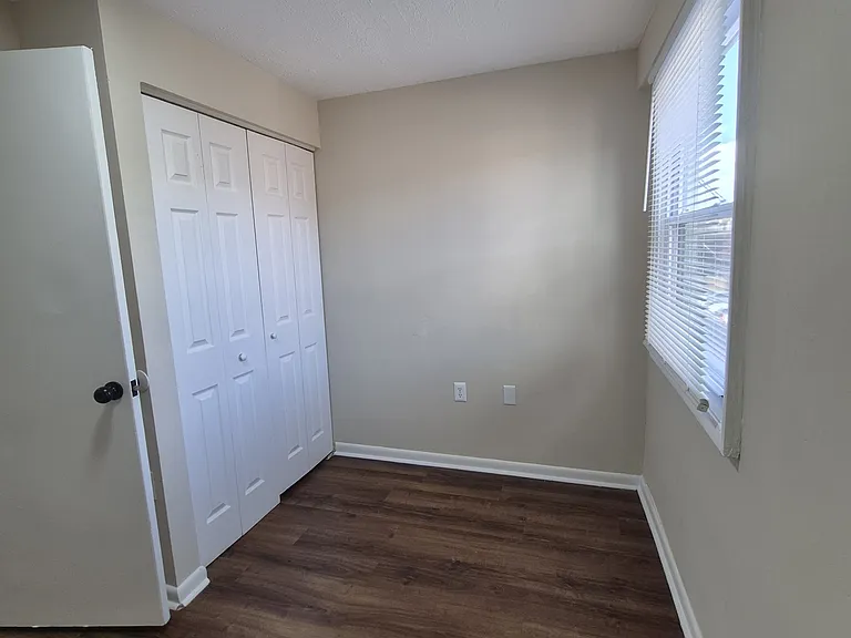 Second bedroom with room for full size bed.