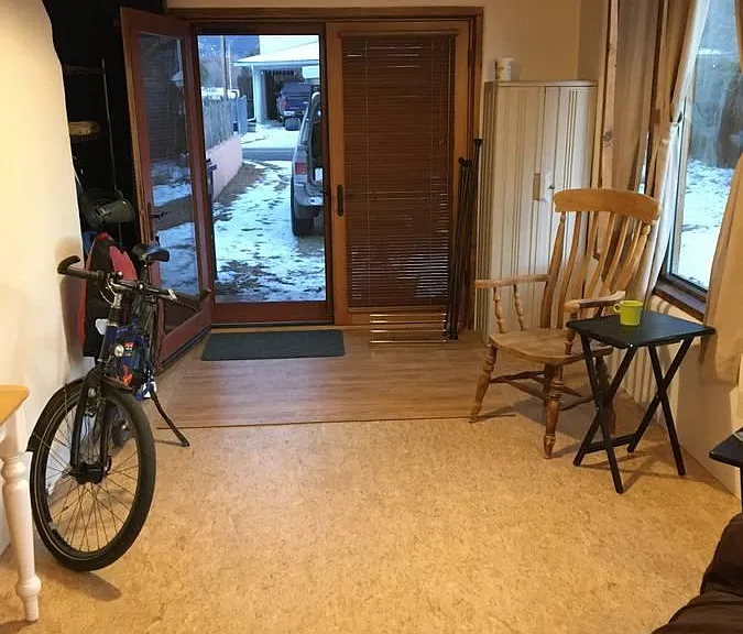 Sunroom with French doors to driveway