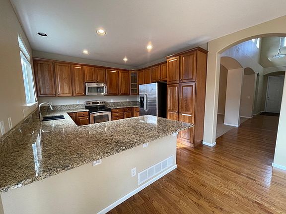 Kitchen with granite countertops.