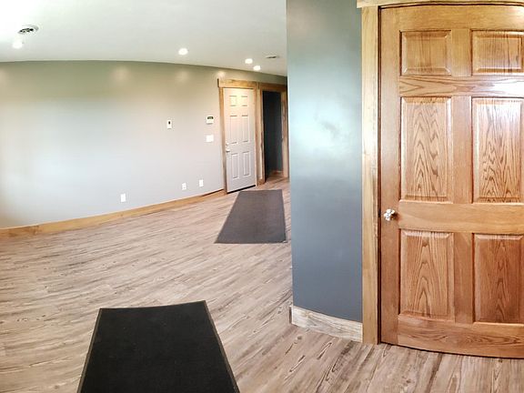Standing at the Front Door