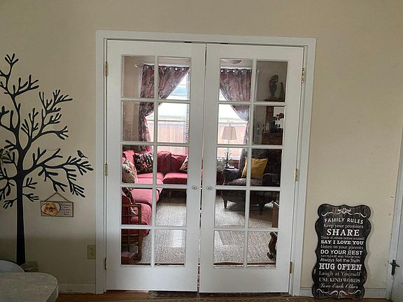 French doors from kitchen leads to spacious living room