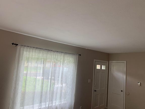 Looking at the front entrance from the kitchen