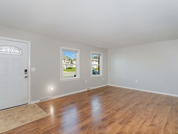Large living room with coat closet