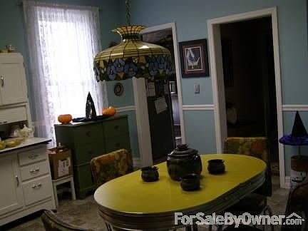 Dining Room : Dining room with chair rail and cherry cabinets