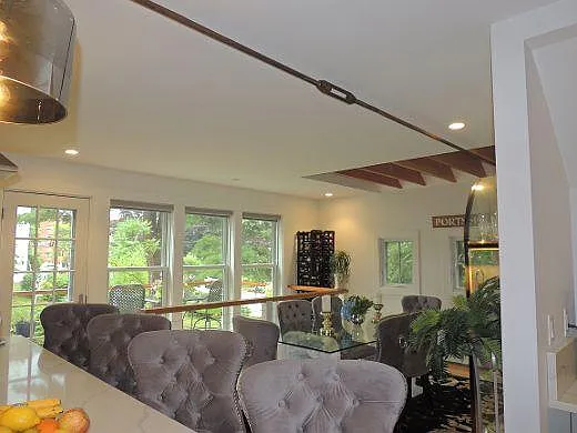 View from kitchen overlooking dining and gardens.